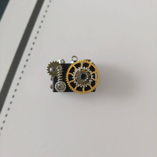 Chrobo –small camera-style handmade punk-style robots, necklaces and bag charms